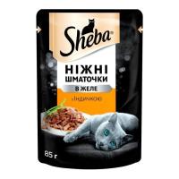 Вологий корм для кішок Sheba cij POU з індичкою в желе 85 г Фото