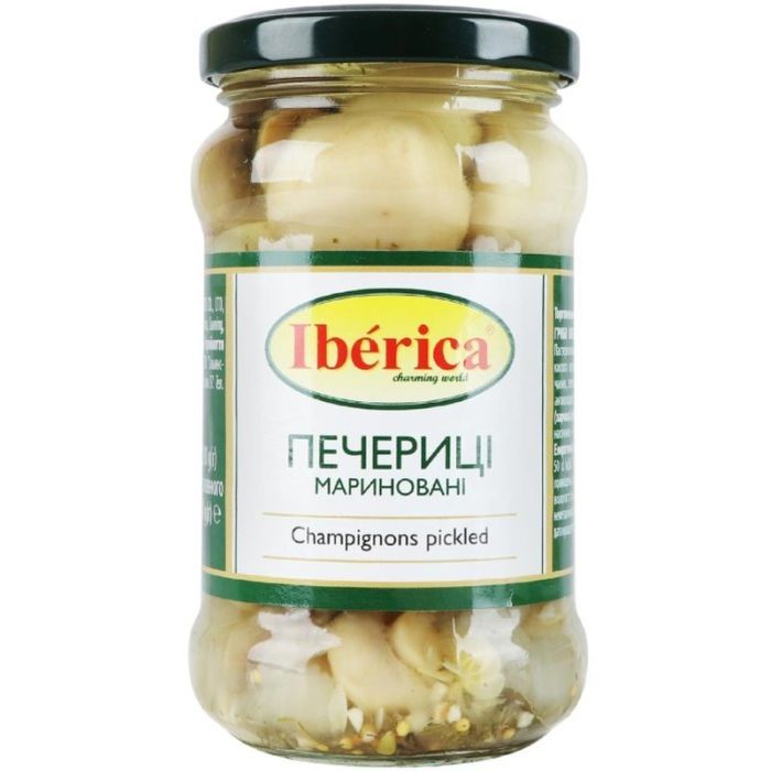 Овощная консервация Iberica Шампиньоны маринованные цели 314 мл Фото